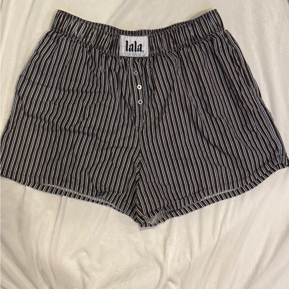 Dressed in LALA boxer shorts